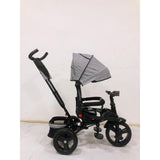 Tricicleta  plus 8 luni evolutiva, cu pozitie de somn, scaun rotativ si muzica distractiva, culoare GRI, BBD5099EVAG