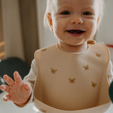 Baveta moale, Petite&Mars, Take&Match, Reglabila, Cu buzunar colector, Silicon, Fara BPA, 6 luni+, Bitter Cocoa, Maro