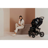 Carucior sport, Lionelo, Annet Tour Golden Moments, Editie Limitata, 0 luni+, Capotina impermeabila UPF 50+, Maner reglabil, Plasa de tantari, Suport biberon, Saculet pentru picioare, Pana la 22 kg, Certificare TUV, Negru