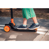 Trotineta, Lionelo, Timy, Copii, Ultrapliabila, Pana la 50 Kg, Cu design ergonomic, Cu lumini LED, 26 5 x 60 x 64-76 cm, 3 ani+, Portocaliu/Negru