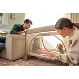 Patut pliant, Lionelo, Laura, 102 x 74 cm, Cu doua nivele, Functie de tarc, Cu roti, Include salteluta si geanta de transport, Pereti din plasa, Deschidere laterala, Pana la 15 kg, 0 luni +, Bej