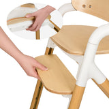 Scaun de masa multifunctional Celia, Lionelo, Din lemn de fag, 6 luni- adult, Reglabil pe inaltime, Spatar lat, Sezut ergonomic, Tavita silicon, Suport de picioare reglabil, Greutate maxima 90 Kg, Alb/Natural