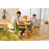 Scaun de masa multifunctional Celia, Lionelo, Din lemn de fag, 6 luni- adult, Reglabil pe inaltime, Spatar lat, Sezut ergonomic, Tavita silicon, Suport de picioare reglabil, Greutate maxima 90 Kg, Alb/Natural