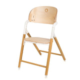 Scaun de masa multifunctional Celia, Lionelo, Din lemn de fag, 6 luni- adult, Reglabil pe inaltime, Spatar lat, Sezut ergonomic, Tavita silicon, Suport de picioare reglabil, Greutate maxima 90 Kg, Alb/Natural