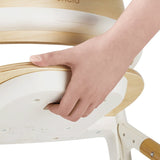 Scaun de masa multifunctional Celia, Lionelo, Din lemn de fag, 6 luni- adult, Reglabil pe inaltime, Spatar lat, Sezut ergonomic, Tavita silicon, Suport de picioare reglabil, Greutate maxima 90 Kg, Alb/Natural