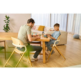 Scaun de masa multifunctional Celia, Lionelo, Din lemn de fag, 6 luni- adult, Reglabil pe inaltime, Husa impermeabila, Tavita silicon, Suport de picioare reglabil, Greutate maxima 90 Kg, Negru