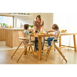 Scaun de masa multifunctional Celia, Lionelo, Din lemn de fag, 6 luni- adult, Reglabil pe inaltime, Spatar lat, Sezut ergonomic, Tavita silicon, Suport de picioare reglabil, Greutate maxima 90 Kg, Gri