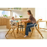 Scaun de masa multifunctional Celia, Lionelo, Din lemn de fag, 6 luni- adult, Reglabil pe inaltime, Spatar lat, Sezut ergonomic, Tavita silicon, Suport de picioare reglabil, Greutate maxima 90 Kg, Gri