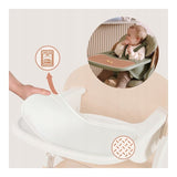 Scaun de masa multifunctional Megan, Lionelo, Din lemn de fag, 6 luni- adult, Reglabil pe inaltime, Husa impermeabila, Tavita silicon, Suport de picioare reglabil, Greutate maxima 110 Kg, Alb/Natur