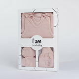 Set 7 piese, New Baby, Include body cu maneca lunga, bluza, pantalonasi cu botosei, salopeta fara maneci, caciulita, manusi, botosei, Marime 56, Din bumbac 100%, I am Pink