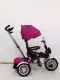 Tricicleta  evolutiva, roti cauciuc, cu pozitie de somn, scaun rotativ si muzica distractiva, culoare MOV, BBD5199M