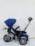 Tricicleta  evolutiva, roti cauciuc, cu pozitie de somn, scaun rotativ si muzica distractiva, culoare ALBASTRU BBD5199A